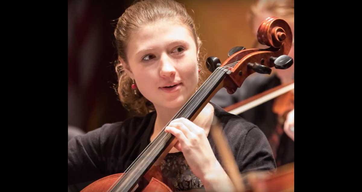 A female student playing an instrument