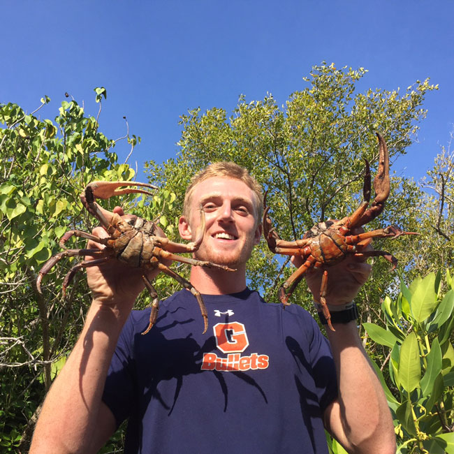 Cody surveying brown land crabs