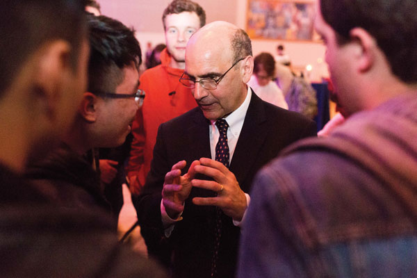 President Bob Iuliano speaking with students