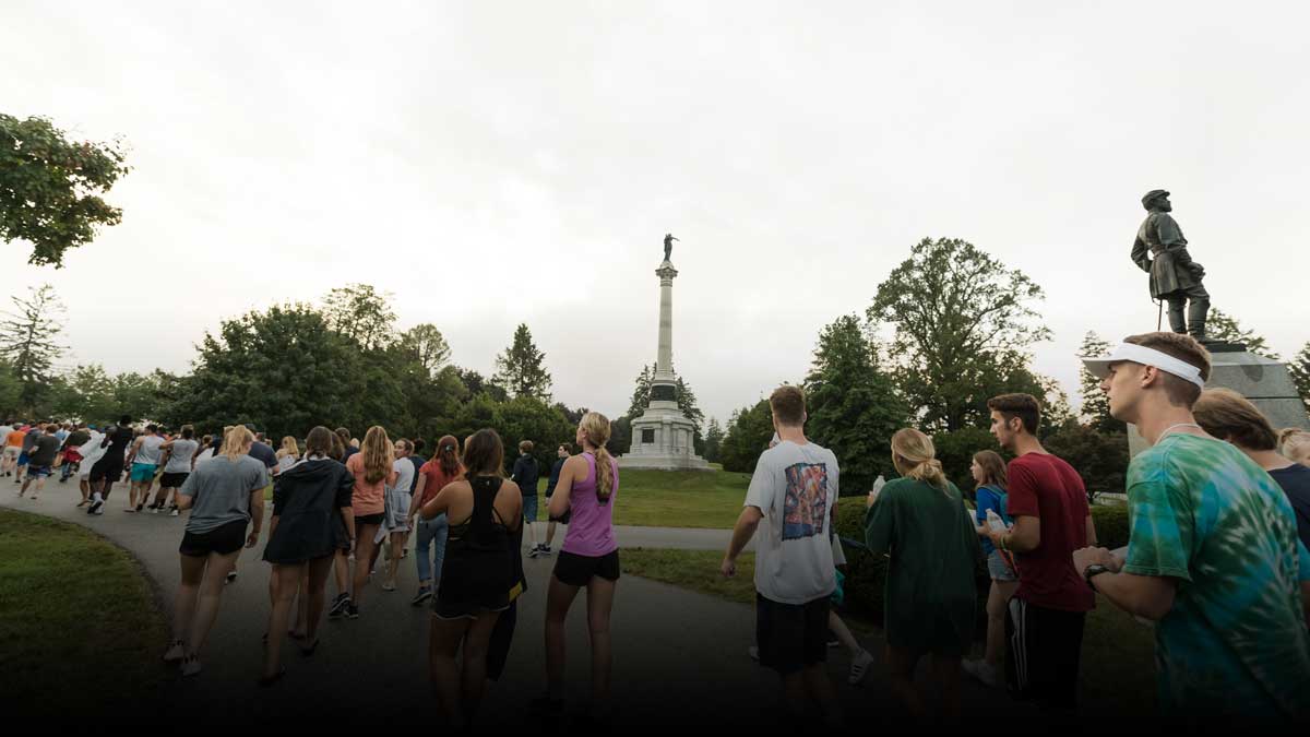 Class of 2023 process through Soldiers’ National Cemetery