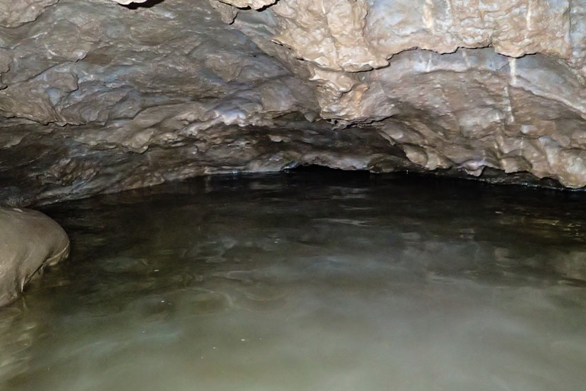 Cave passage with water up to the ceiling