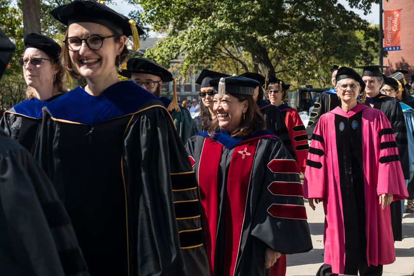 Robed professors in the processional line