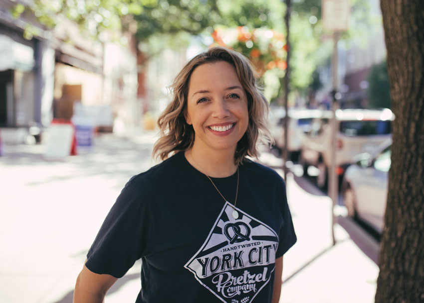 Meagan Given wearing a York City Pretzel Company t-shirt