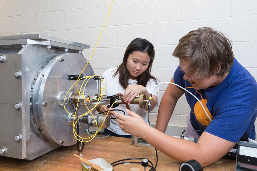 Students working with technology in a lab