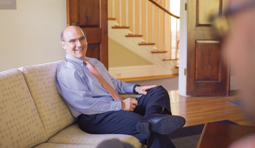 Bob Iuliano sitting and smiling