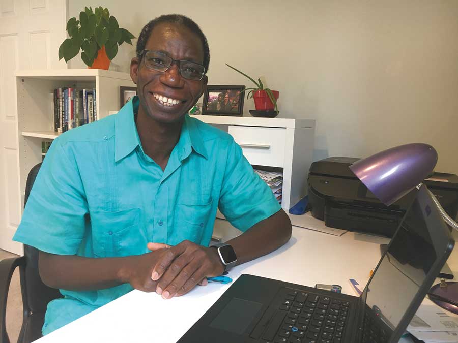 Professor Abou Bamba sitting in his office