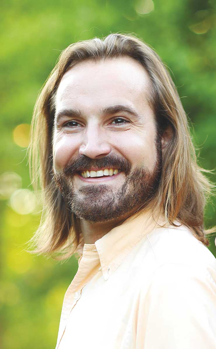 Headshot of Alexander Lopez-Wilson