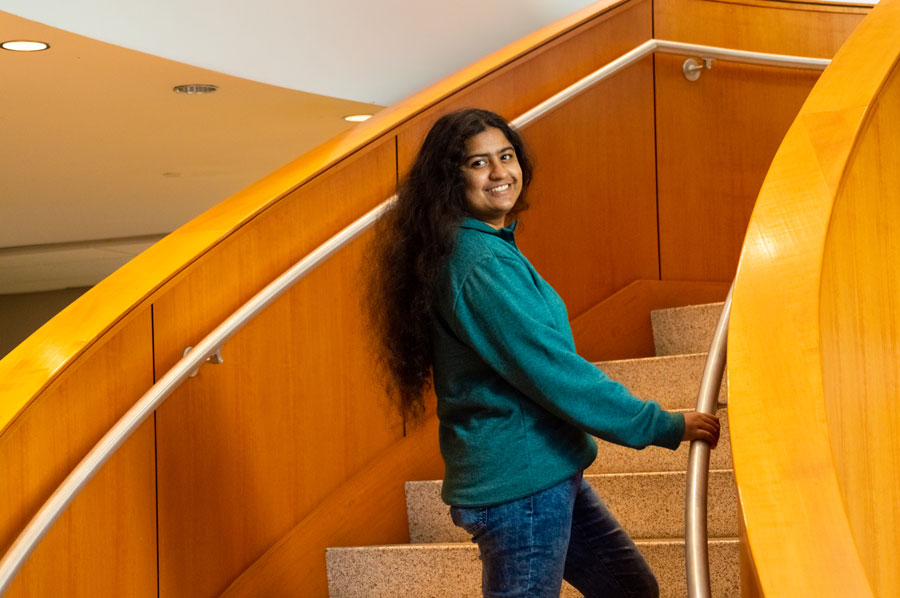 Meem Noshin Nawal Khan standing on the steps of the science center