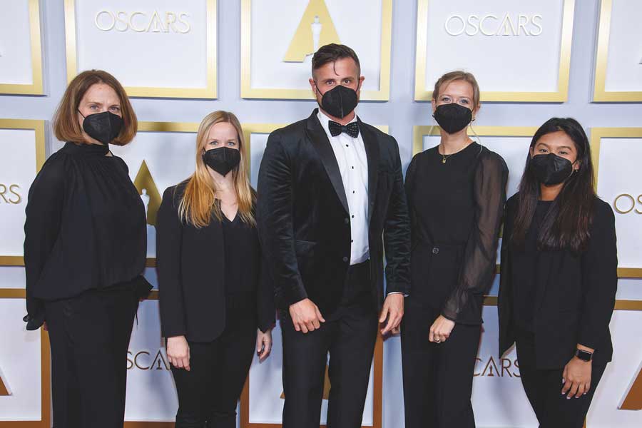 Cynthia Hill with her masked colleagues at the Oscars