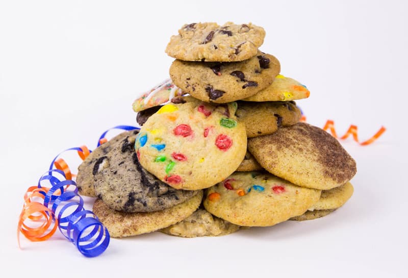 assorted SERVO cookies with orange and blue ribbons