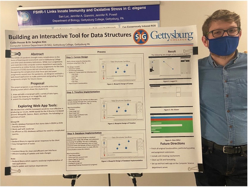 Collin Presser showing his research poster