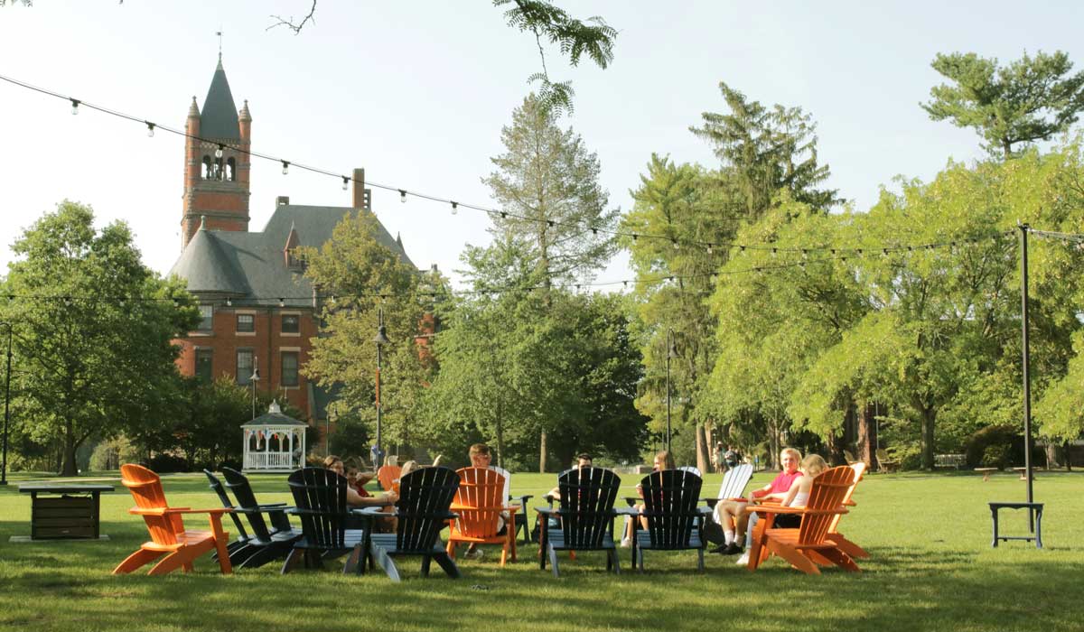 Orange and Blue adirondack chairs outside on Gettysburg College's campus