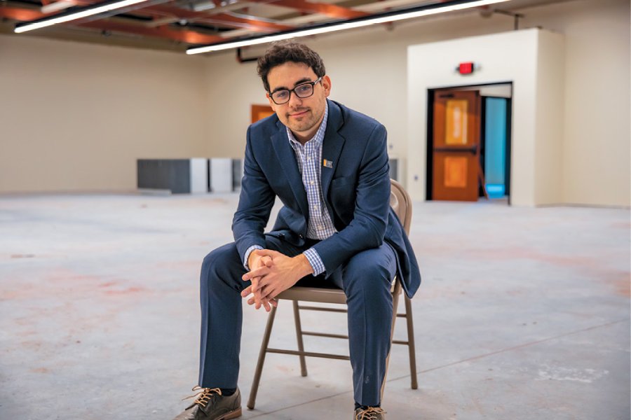 Andrew sits in new museum