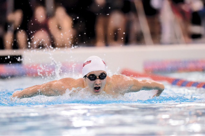 Bullets team member swimming in a pool