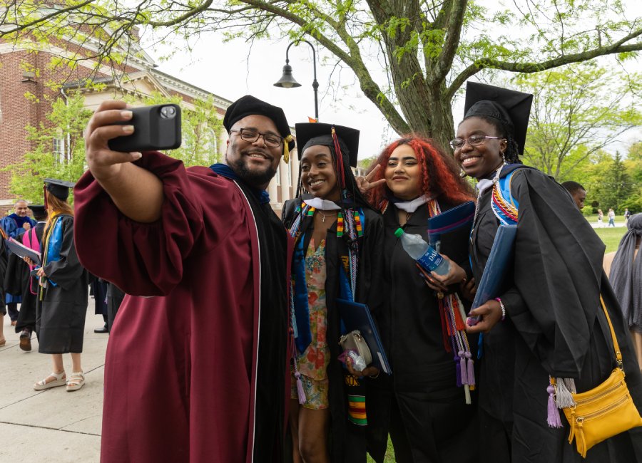 Group of graduates taking a selfie