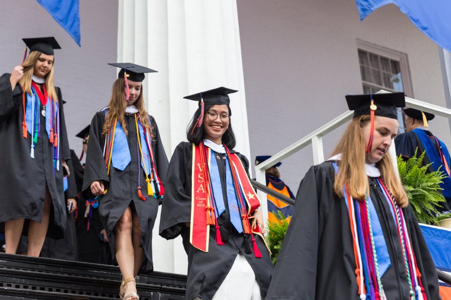 Graduates walking down the stairs