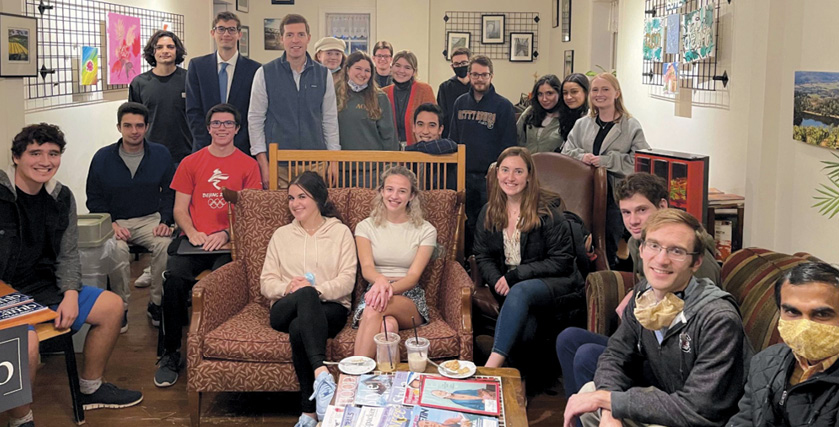 Douglas Page in a room with College Democrats and Conor Lamb