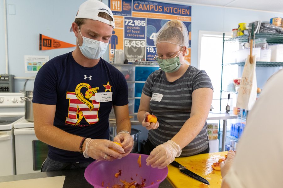 Student volunteering at the campus kitchen