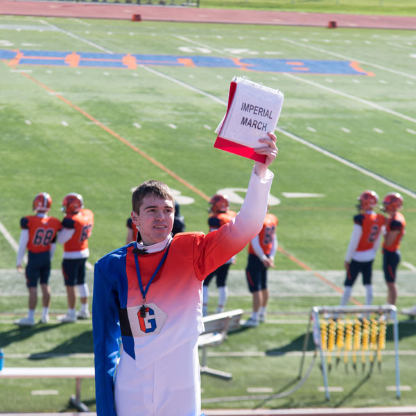 Drum Major Ben Pontz directing the Bullets Marching Band