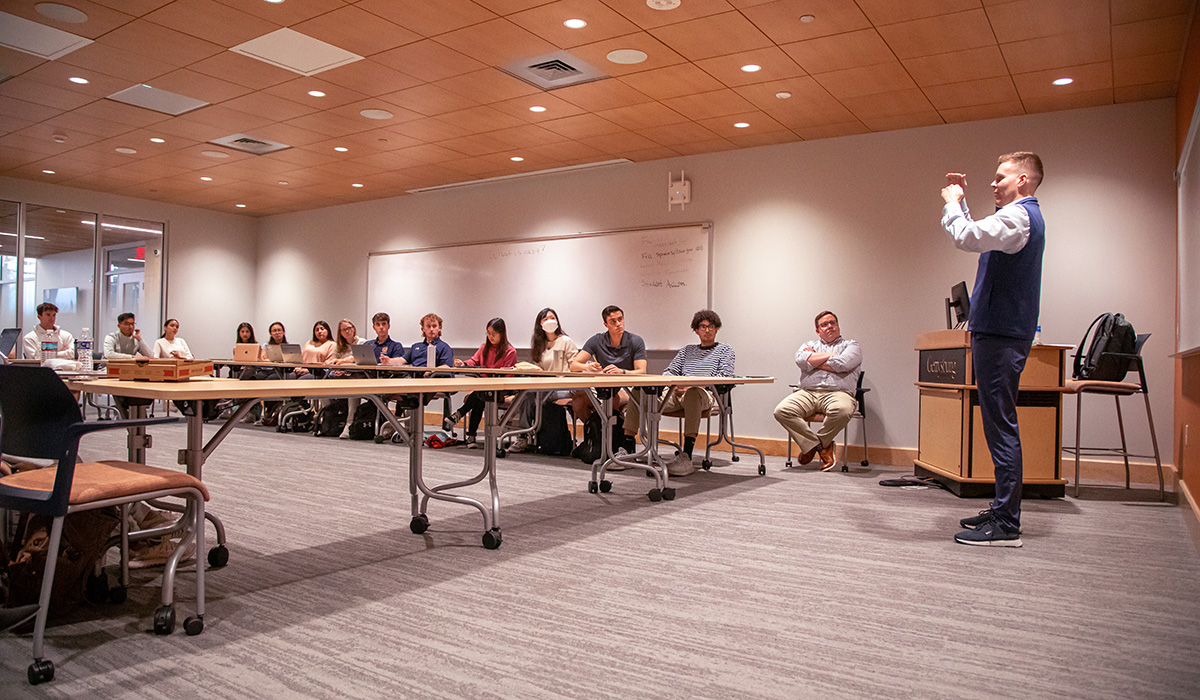 Richard Kampart speaking to a class 