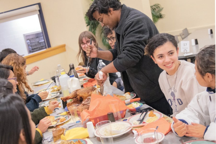 Students eating thanksgiving dinner at Servo
