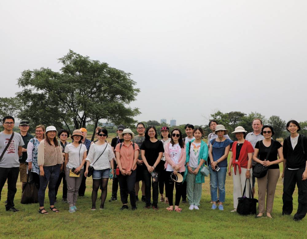 Prof. Yan Sun (front row, fourth from right) in August 2018 with Xiyang Duan ’17 at an archaeological site
