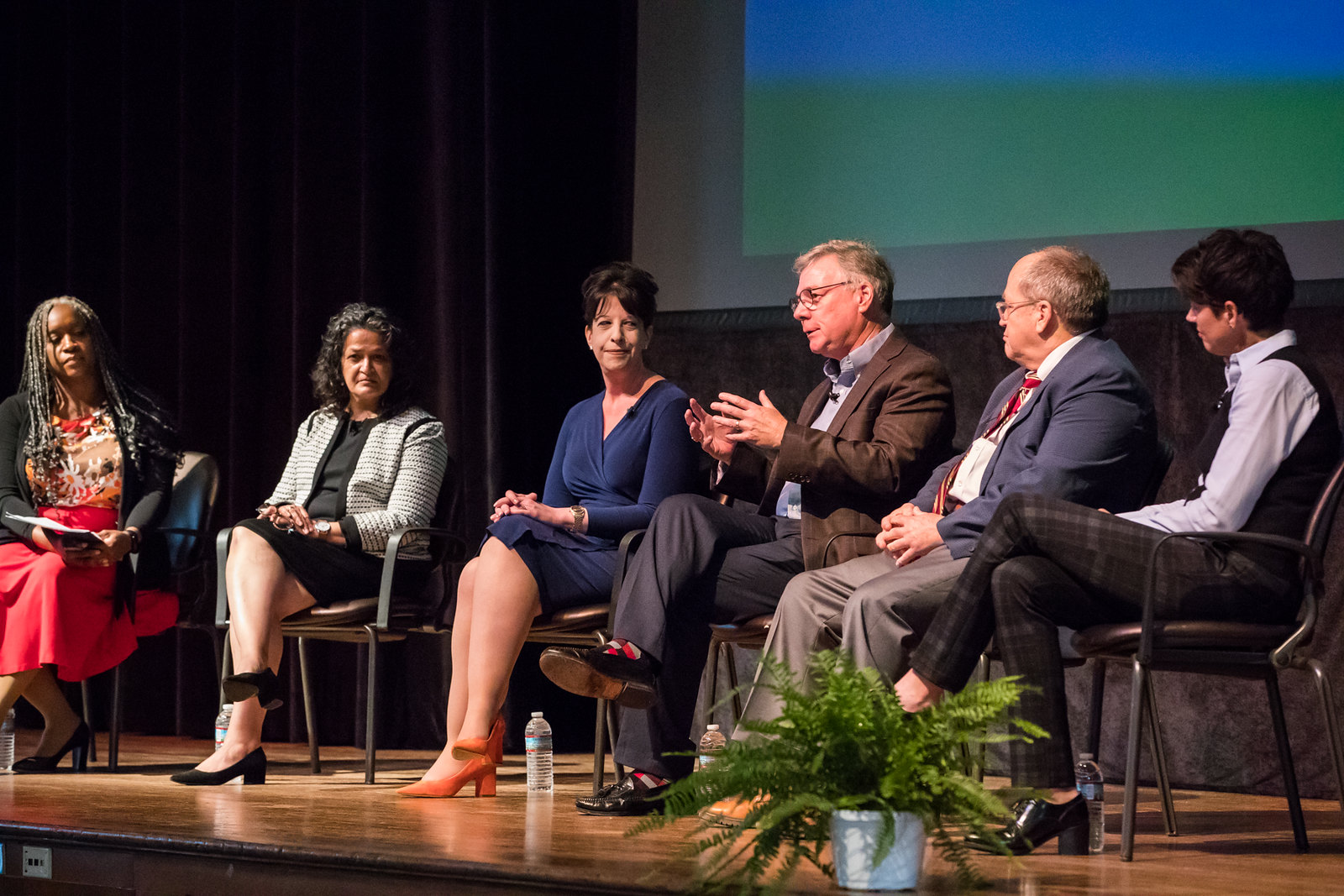 President's Council speaks to audience from stage