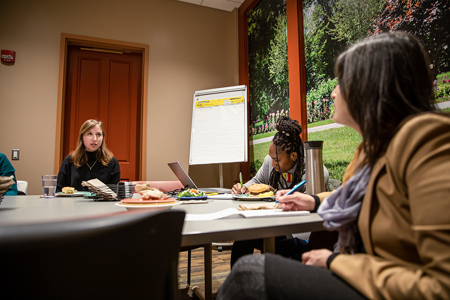 Camille Traczek ’22 talks to a group