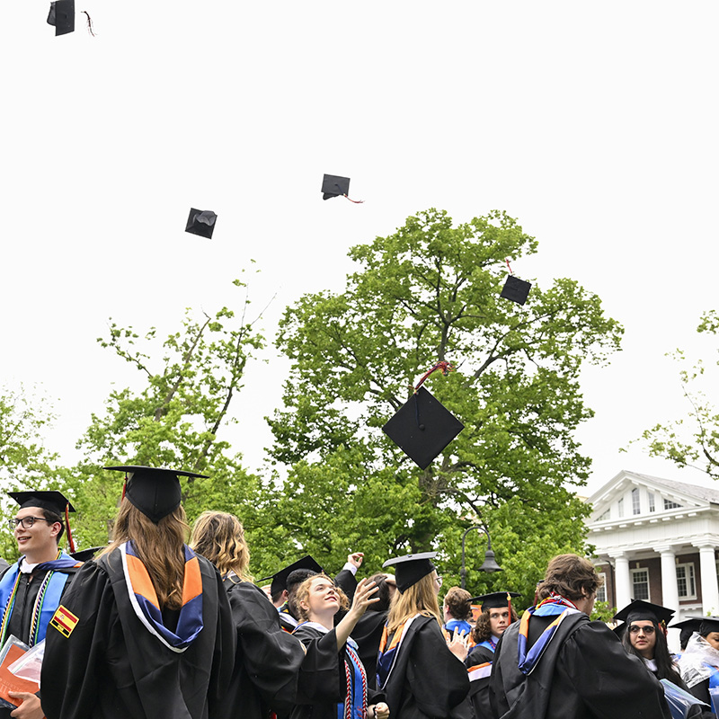 Graduates tossing their caps