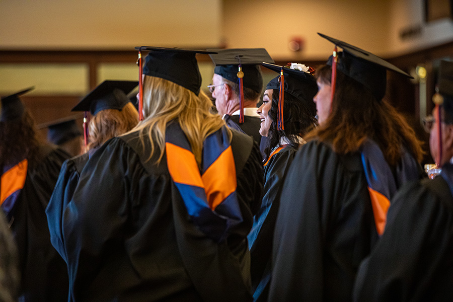 Students walk in procession during Commencement 
