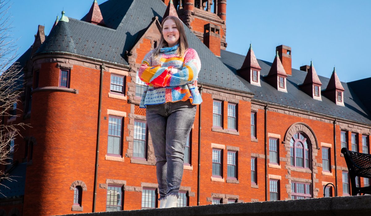 Lauren standing in front of a building