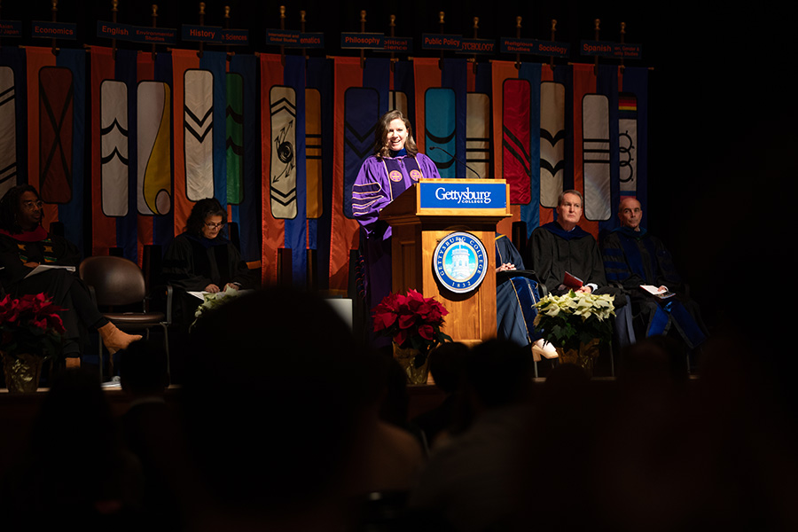 Prof. Heather Odle-Dusseau speaks at the Midyear Graduation Ceremony