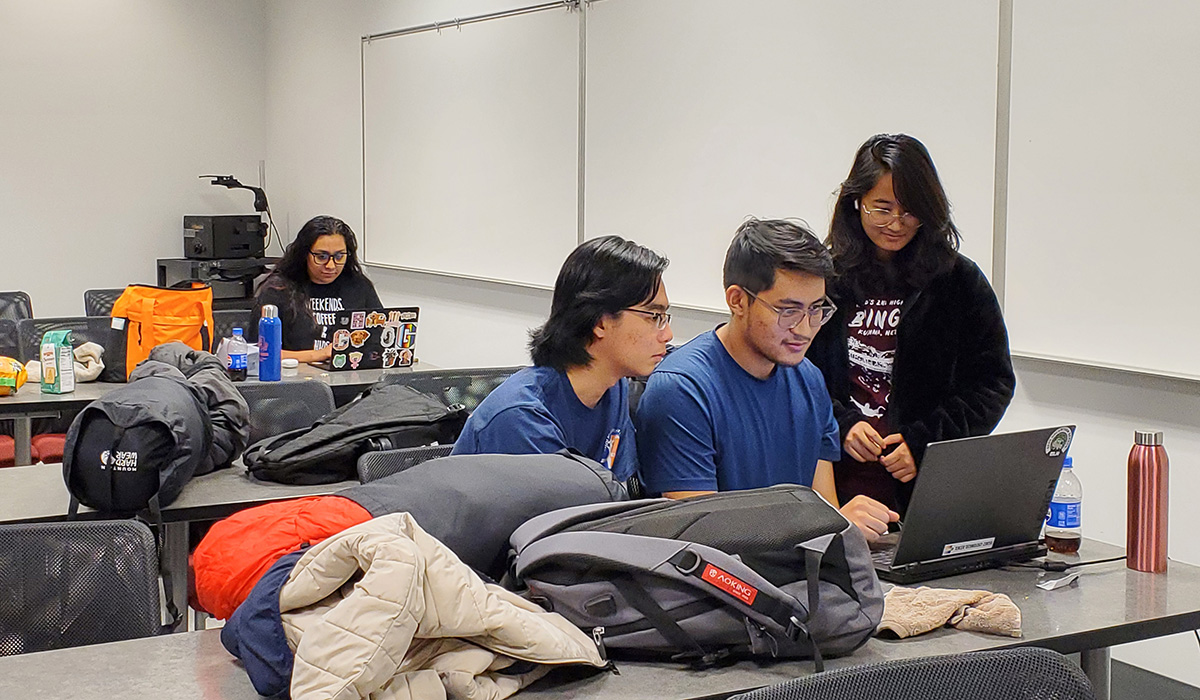 Thuc Duy Tran ’27, Sanij Shrestha ’26, and Yashaswe Amatya ’26, along with Thuc Duy Tran ’27 work on a project