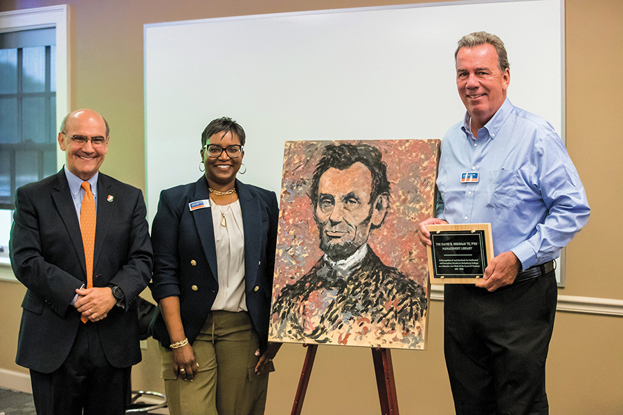 President Bob Iuliano, David Brennan ’75, P’00 and Lauren Wise Bright ’90