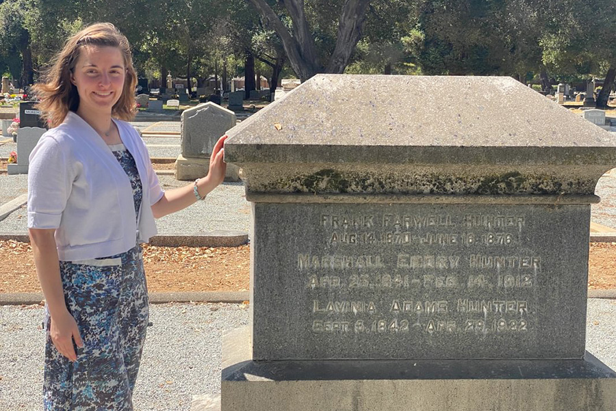 Danielle Russell '25 stands by a historical monument