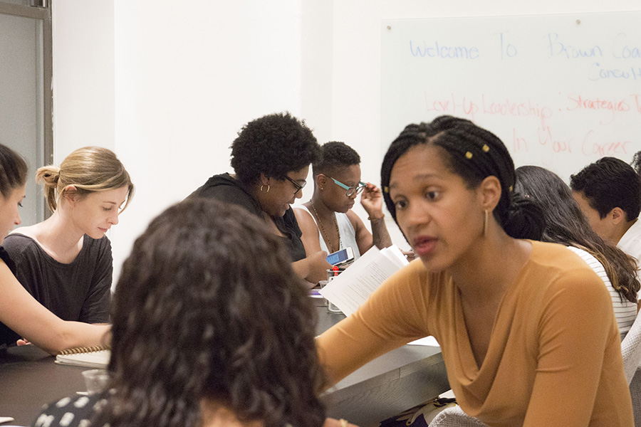 Lawrese Brown ’10, founder and CEO of C-Track Training talks to a young professional