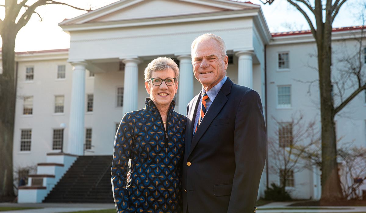 Joan ’76 and Rick Schweizer ’76 in front of Penn Hall