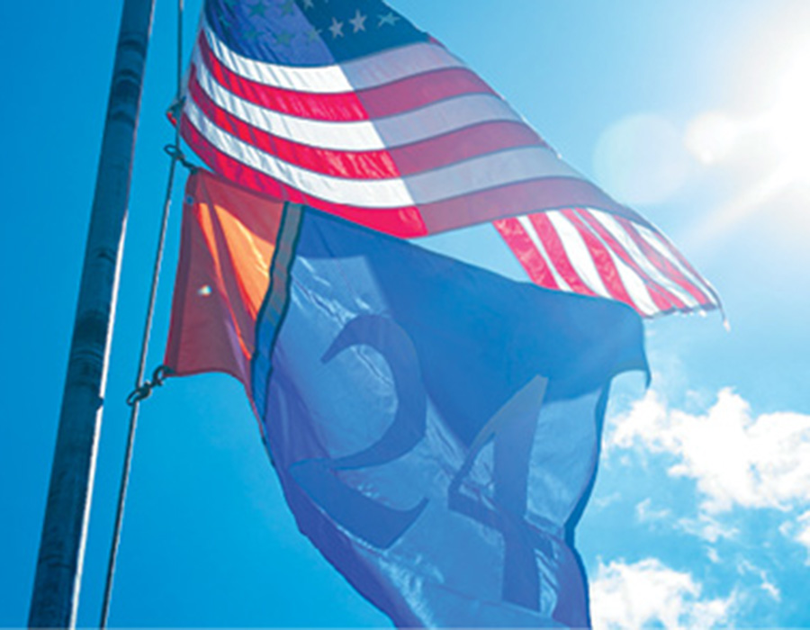 A photo of the American and Gettysburg College flag on a pole