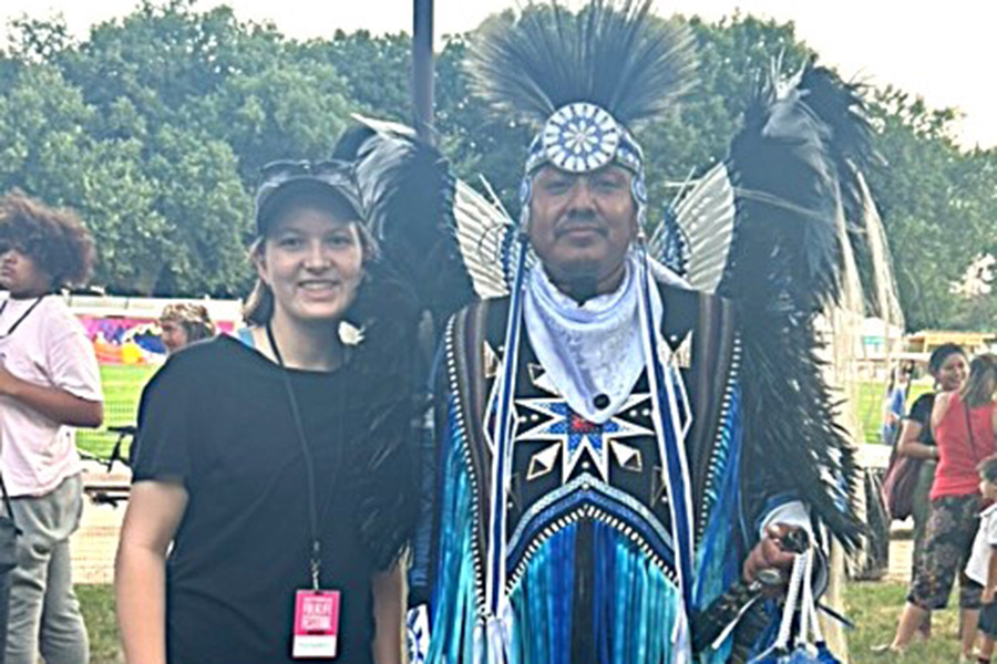 Szczepkowicz with a member of the Native American dance troupe Indigenous Enterprise