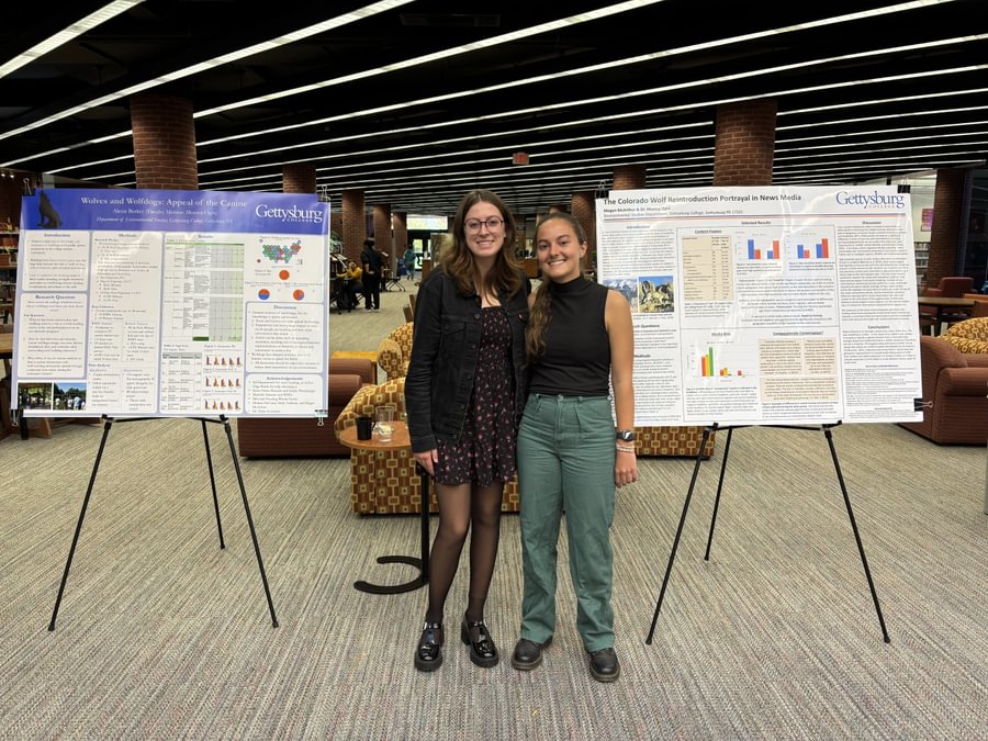 Alexis Berkey and Megan McArthur present research with Prof. Ogra as Kolbe Fellows.