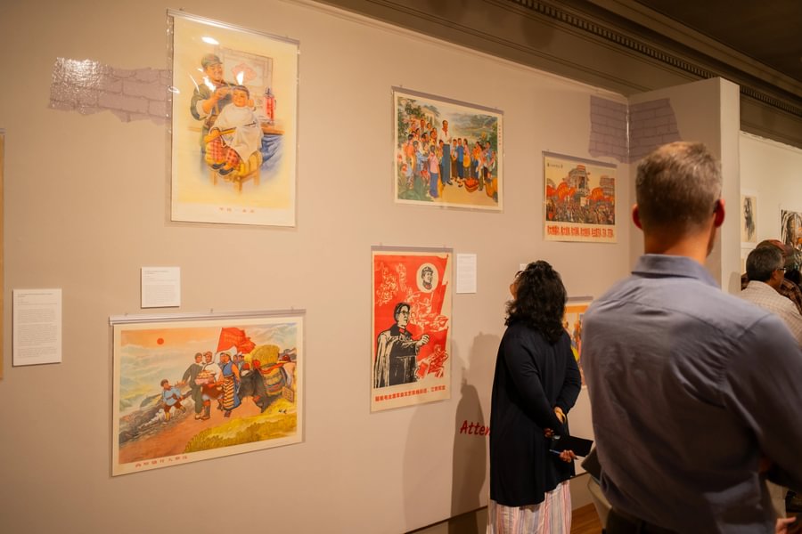 Visitors view Ava Prickman ’28’s exhibit at Schmucker Art Gallery.
