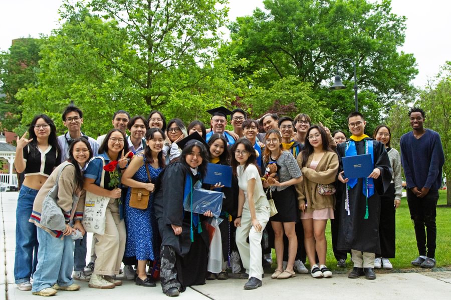 An image of Brad Lancaster (middle) with a group of students