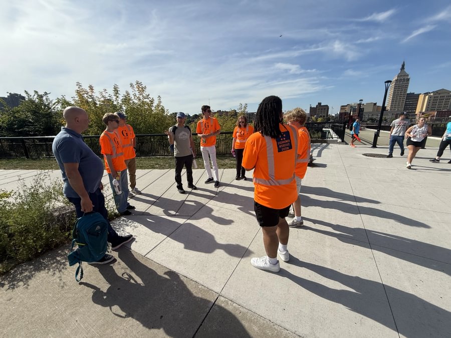  Students stand in an area of Rochester, New York, where a section of highway was removed about a decade ago.