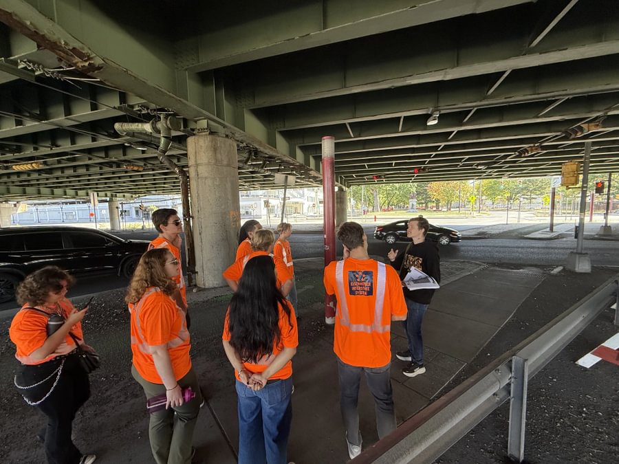  Gettysburg students stand under a section of the I-81 viaduct that was built through the south side of Syracuse, New York.