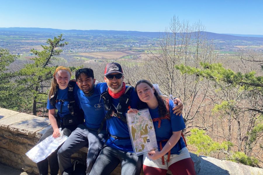 Emily Lyons ’26 orienteering with the GLC team in Maryland.