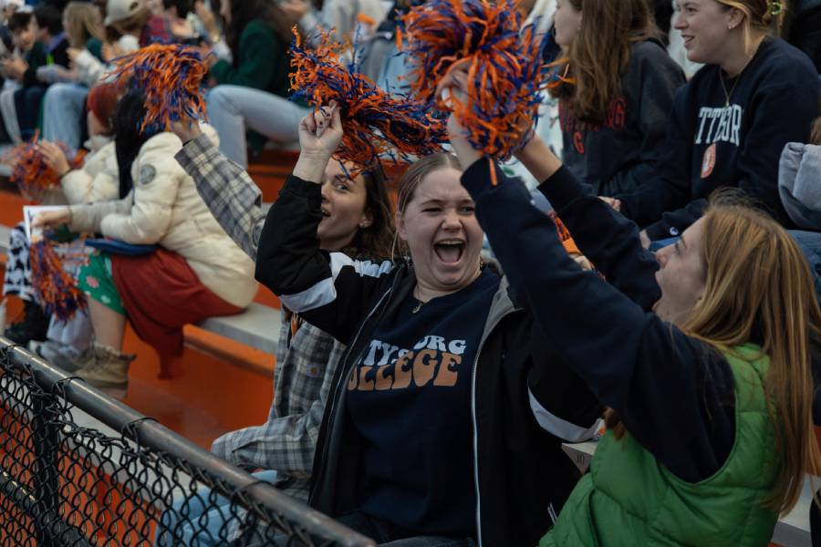 Students cheer for the men’s lacrosse team at Shirk Field at Musselman Stadium.