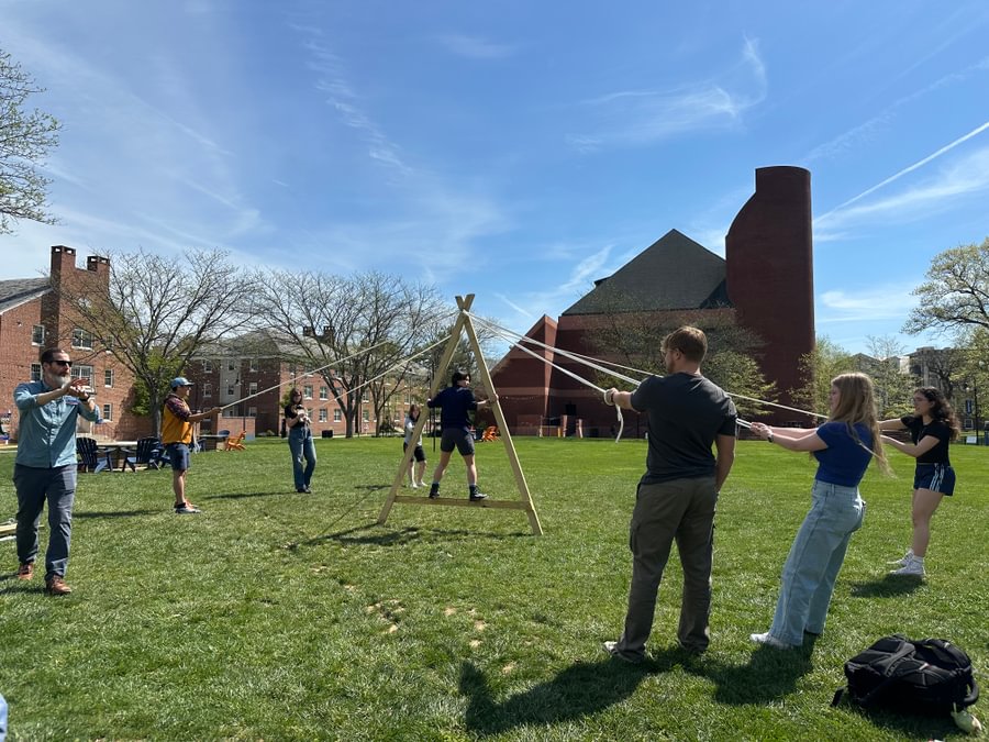 Students participate in a leadership and teamwork-building activity