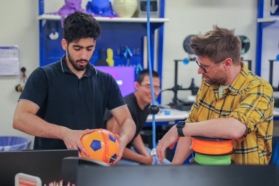 Anwar Reghai ’27 and Josh Wagner develop an augmented reality soccer game.