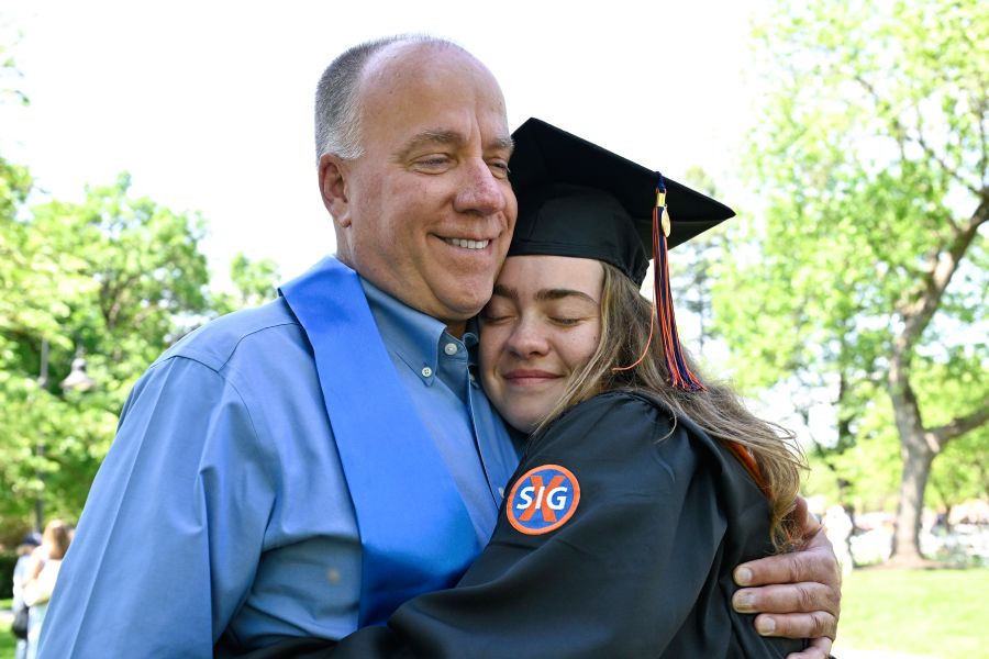 Jack Comegno ’24 embraces his mother, Marsha (Hoffman) Comegno ’94