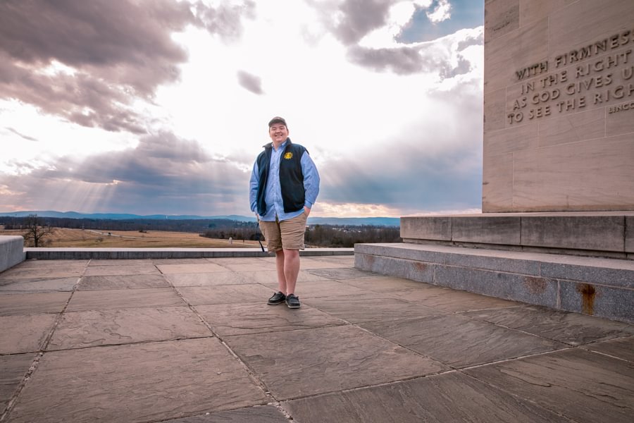 Owen Lanier ’25 at the Eternal Light Peace Memorial at Gettysburg National Military Park.